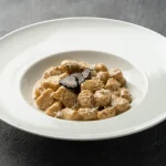 Close-up of gnocchi with rich porcini mushrooms and truffle aroma at Secret Oven Koh Samui