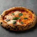 Homemade Margherita pizza baked with fresh tomatoes, mozzarella, and basil at Secret Oven restaurant