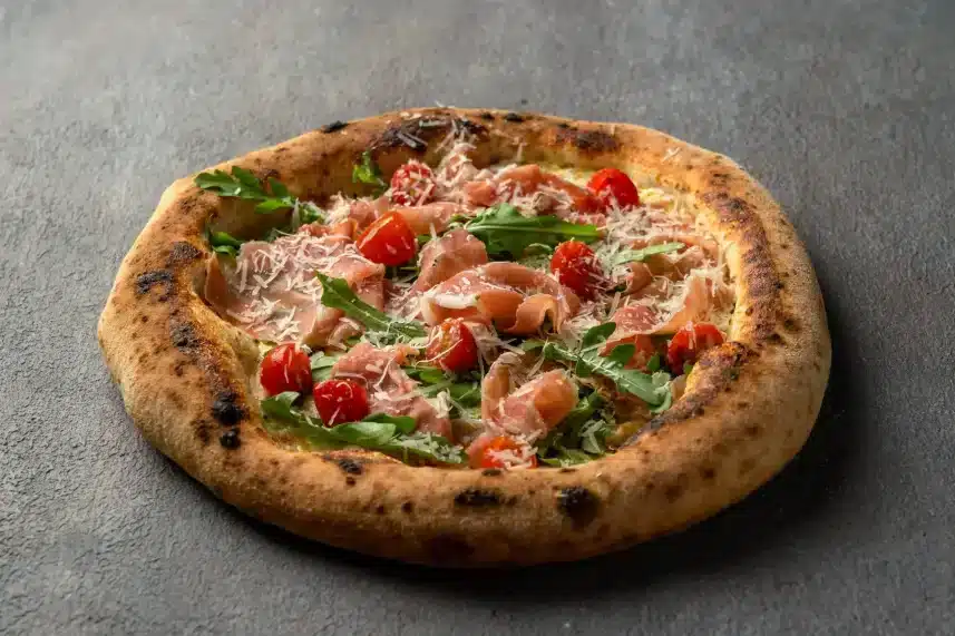 Secret Oven’s thin-crust Pizza Parma with Parma ham, arugula, and shaved parmesan